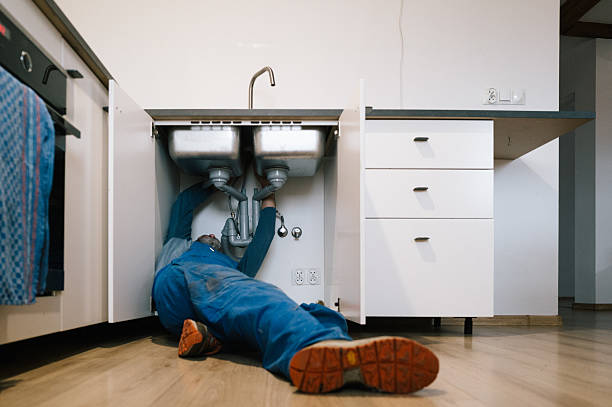 Professional Emergency Plumber technician working in Rockton, IL